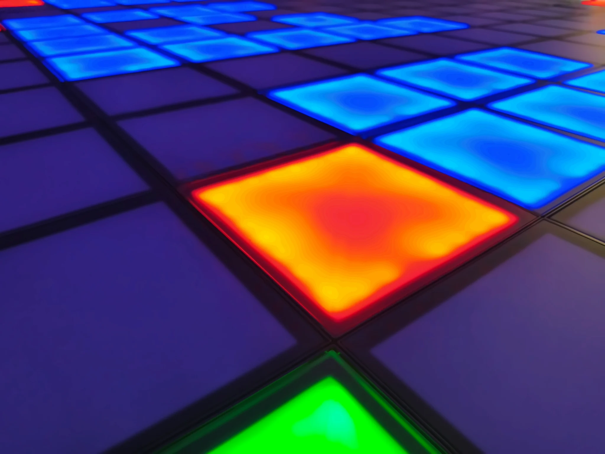 Gros plan du sol interactif lumineux Pixel Arena